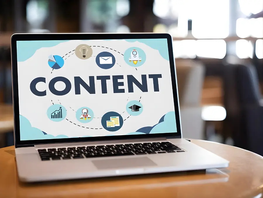 A laptop displaying a graphic for Content Services for SMBs, featuring the word "CONTENT".